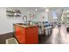 Open living space with stainless steel appliances, granite countertops, and view into living area at 1133 Metropolitan Ave # 318, Charlotte, NC 28204
