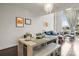 Open concept living and dining area, showcasing the modern design and natural light at 1133 Metropolitan Ave # 318, Charlotte, NC 28204