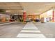 A well-maintained parking lot with pedestrian walkway and easy store access at 1133 Metropolitan Ave # 318, Charlotte, NC 28204