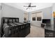 Another view of this bedroom with a ceiling fan and lots of natural light at 119 Charthouse Ln, Mooresville, NC 28117