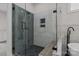 Bathroom showcasing glass enclosed shower with built in shelf and matte black hardware at 123 Mills Garden Rd, Statesville, NC 28625