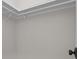 Simple closet showing white walls, a hanging rod, and bracket supports, providing basic storage solutions at 123 Mills Garden Rd, Statesville, NC 28625