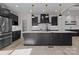 Contemporary kitchen with dark cabinets, stainless steel appliances, a large center island, and modern pendant lights at 123 Mills Garden Rd, Statesville, NC 28625