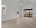 Bright living room with vaulted ceilings and sliding doors to the back deck at 123 Mills Garden Rd, Statesville, NC 28625