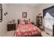 Cozy bedroom featuring a floral comforter and antique accents at 123 Wheatridge Dr, Statesville, NC 28625