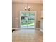 Dining room features a sliding glass door providing a seamless transition to the outdoors at 12403 Panthersville Dr, Charlotte, NC 28269