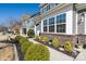 Beautifully landscaped front yard with lush greenery and a charming walkway to the entrance at 126 W Morehouse Ave, Mooresville, NC 28117