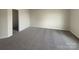 Comfortable bedroom with neutral carpet and an open doorway at 1298 Bryson Ln, Denver, NC 28037