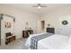 Bright bedroom with soft carpet, desk, and decorative accents at 14707 Batteliere Dr, Charlotte, NC 28278