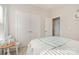 Cozy bedroom with a double closet, table, and white furniture at 14707 Batteliere Dr, Charlotte, NC 28278