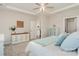Neutral bedroom with white furniture and a view into the en-suite bathroom at 14707 Batteliere Dr, Charlotte, NC 28278