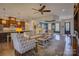 Spacious open concept living room featuring hardwood floors, modern furnishings, and ample natural light at 14830 Creeks Edge Dr, Charlotte, NC 28278