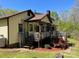 This is the back of the home, with a large deck area for entertaining at 1496 Givens St, Hickory, NC 28602