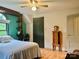 Well-lit bedroom features a modern ceiling fan, hardwood floors, and ample natural light for a bright and airy feel at 1496 Givens St, Hickory, NC 28602
