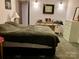 Cozy bedroom with carpet, side table, soft lighting, and a relaxing atmosphere at 1496 Givens St, Hickory, NC 28602