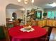 Cozy dining area with hardwood floors adjoins the living room and kitchen at 1496 Givens St, Hickory, NC 28602