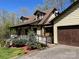 Charming home with a welcoming front porch and well-maintained landscaping at 1496 Givens St, Hickory, NC 28602