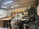 Well-lit garage with woodworking tools, cabinets and storage at 1496 Givens St, Hickory, NC 28602