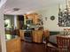 Kitchen view with stainless steel appliances and hardwood floors that lead to dining area at 1496 Givens St, Hickory, NC 28602