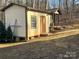 Exterior of a small outbuilding with simple architecture and natural surroundings at 1496 Givens St, Hickory, NC 28602