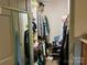 Well-organized walk-in closet featuring built-in shelving and ample storage space for clothes and accessories at 1496 Givens St, Hickory, NC 28602