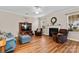 Cozy living room with a fireplace, large windows, and plush seating at 2003 Savoy Ct, Indian Trail, NC 28079