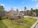 Expansive aerial view of the home showcasing its large yard, mature trees, and neighborhood setting at 3019 Foggy Hollow Ln, Clover, SC 29710
