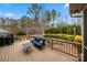 Relaxing back deck with outdoor seating and grill, perfect for entertaining at 3019 Foggy Hollow Ln, Clover, SC 29710