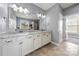 Bright bathroom with double sinks, granite countertops, and tiled flooring at 3019 Foggy Hollow Ln, Clover, SC 29710