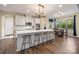 Open kitchen layout with a view of the breakfast nook with stainless steel appliances and hardwood flooring at 3019 Foggy Hollow Ln, Clover, SC 29710