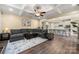 Open-concept living room with view of the kitchen and breakfast bar at 3019 Foggy Hollow Ln, Clover, SC 29710