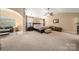 This spacious main bedroom features plush carpet, vaulted ceilings, and windows for natural light at 3019 Foggy Hollow Ln, Clover, SC 29710