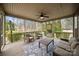Inviting screened porch with comfortable seating and scenic views at 3019 Foggy Hollow Ln, Clover, SC 29710