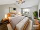 Serene main bedroom featuring a neutral color scheme, vaulted ceiling, and soft natural light at 3078 Des Prez Ave, Fort Mill, SC 29707