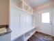Functional mudroom with built-in storage, a bench, and direct access to the outside, perfect for organization at 4016 Landsford Rd, Marshville, NC 28103