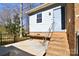 Exterior view featuring a back porch and steps leading to a door at 4456 Carriage Drive Cir, Charlotte, NC 28205