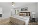 Cozy bedroom with natural light, comfortable bedding, and serene ambiance at 4913 Seacroft Rd, Charlotte, NC 28210
