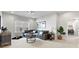 Cozy living room with sectional sofa, movie theme decor, and soft natural light at 5009 Duval Cir, Tega Cay, SC 29708