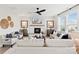 Cozy living room featuring a stone fireplace and comfortable seating at 5009 Duval Cir, Tega Cay, SC 29708