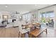 Open living space featuring fireplace, natural light, and dining area at 5009 Duval Cir, Tega Cay, SC 29708