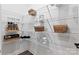 Organized pantry with white wire shelving, baskets, and canisters for storage at 5009 Duval Cir, Tega Cay, SC 29708