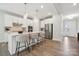 Contemporary kitchen with white cabinets, stainless steel appliances, and a spacious island with seating at 5013 Duval Cir, Tega Cay, SC 29708