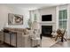 Cozy living room featuring a fireplace, comfortable seating, and modern decor at 5013 Duval Cir, Tega Cay, SC 29708