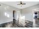 Bright bedroom with dark floors, ensuite bathroom, and laundry area at 508 N Hill St, Dallas, NC 28034