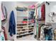 Walk-in closet with custom shelving and ample storage space for shoes, clothes, and accessories at 6187 Cloverdale Dr, Tega Cay, SC 29708