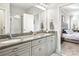 Bathroom featuring double sinks, granite counters, and a glass-enclosed shower at 734 Rocky Grove Gln, York, SC 29745