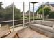Inviting screened porch with comfortable seating and views of the backyard at 7924 Pemswood St, Charlotte, NC 28277