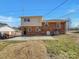 Spacious backyard with large concrete patio, partially fenced yard, and ample space for outdoor activities at 8103 Idlewild Rd, Indian Trail, NC 28079