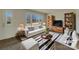 Bright living room with large window, stylish furnishings, and contemporary decor at 8103 Idlewild Rd, Indian Trail, NC 28079