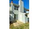 Exterior patio with siding,sliding glass doors, and storage shed at 8224 Golf Ridge Dr, Charlotte, NC 28277